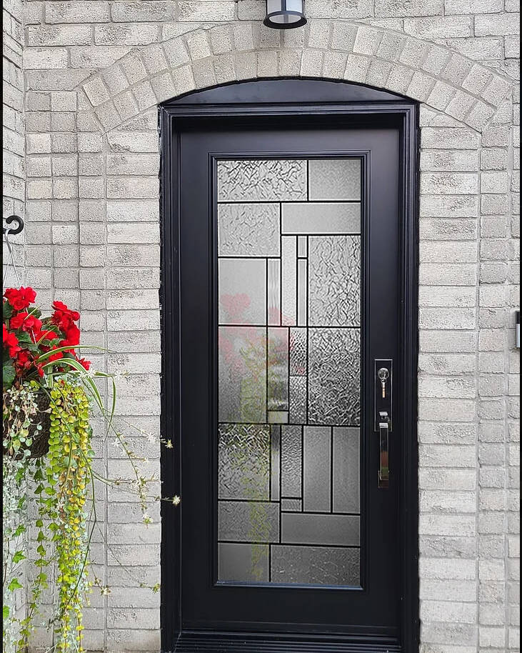 Eternity stained glass inserts in a double front door