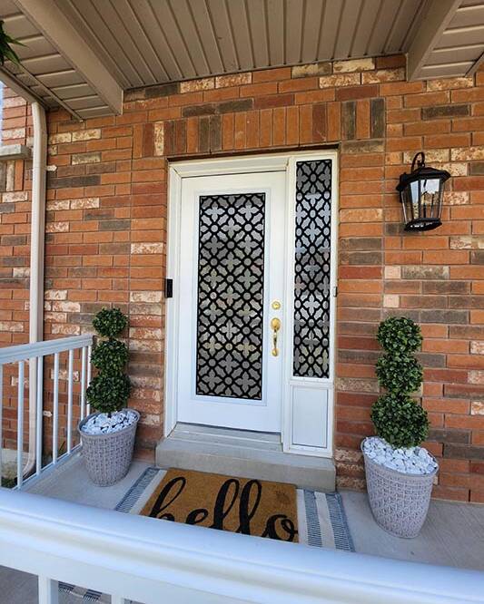 Palisade laser cut iron door insert, installed (photo 3)
