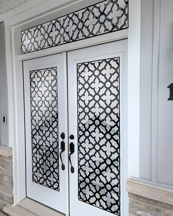 Palisade laser cut iron door insert, installed (photo 4)