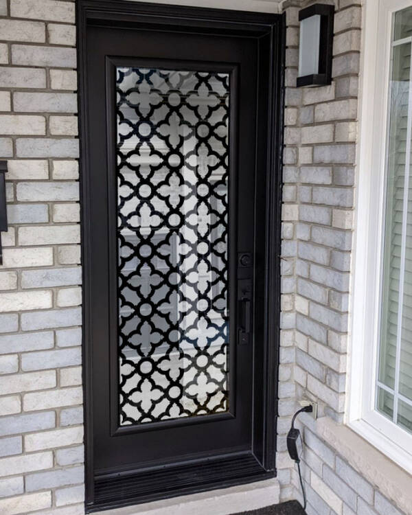 Palisade laser cut iron door insert, installed (photo 6)
