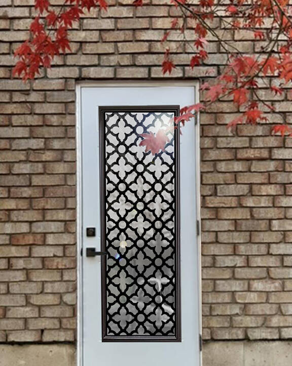 Palisade laser cut iron door insert, installed (photo 7)