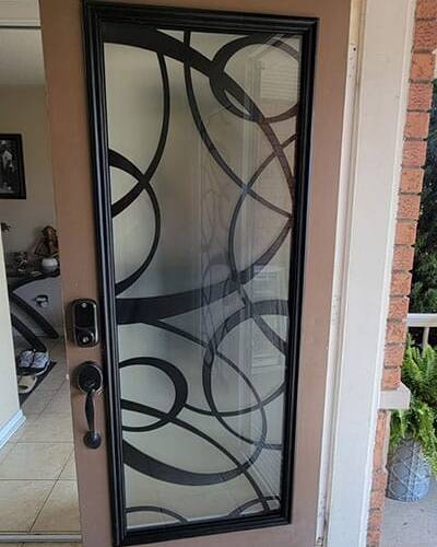 Blazer laser cut iron door insert, installed (photo 10)