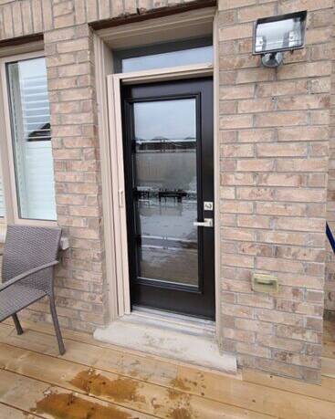 Simplex stained glass door insert, installed (photo 6)