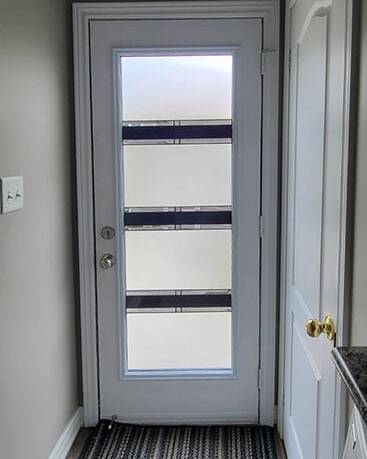 Simplex stained glass door insert, installed (photo 8)