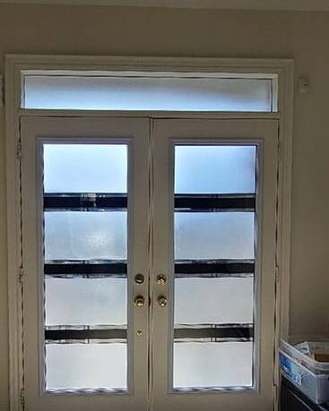 Simplex stained glass door insert, installed (photo 9)