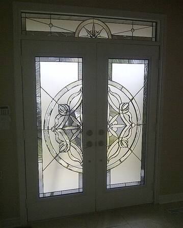 Solstice stained glass door insert, installed (photo 5)