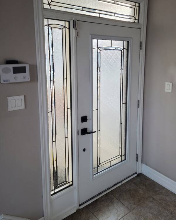 Model A stained glass inserts in a door with a sidelite