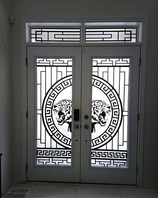 Tigris wrought iron door insert, installed (photo 8)
